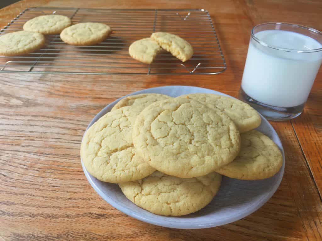 Sugar cookies with a glass of milk.