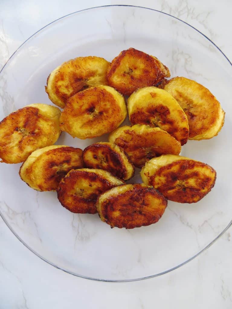 Fried plantains on a plate.